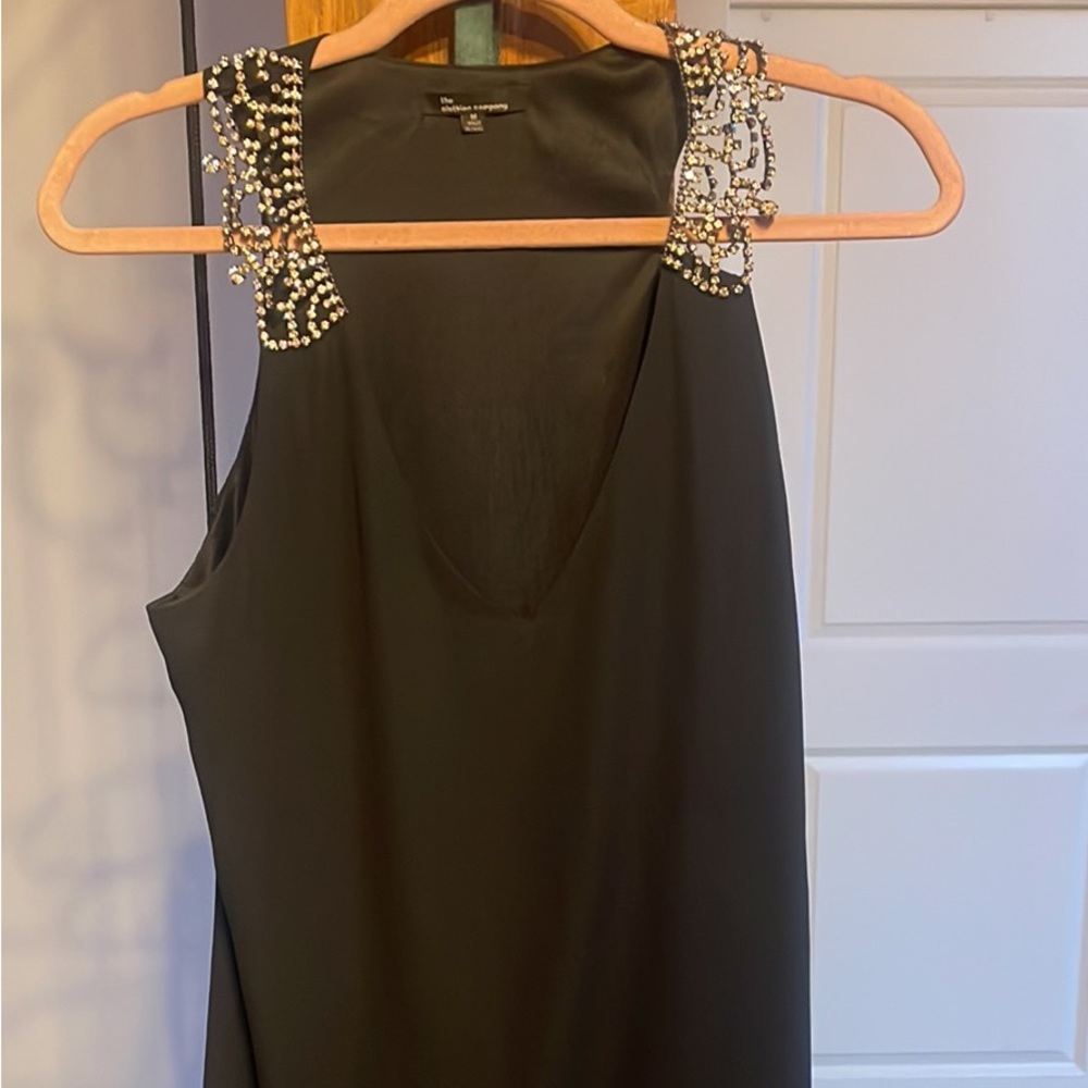 Short black loose fitting dress with rhinestone straps
